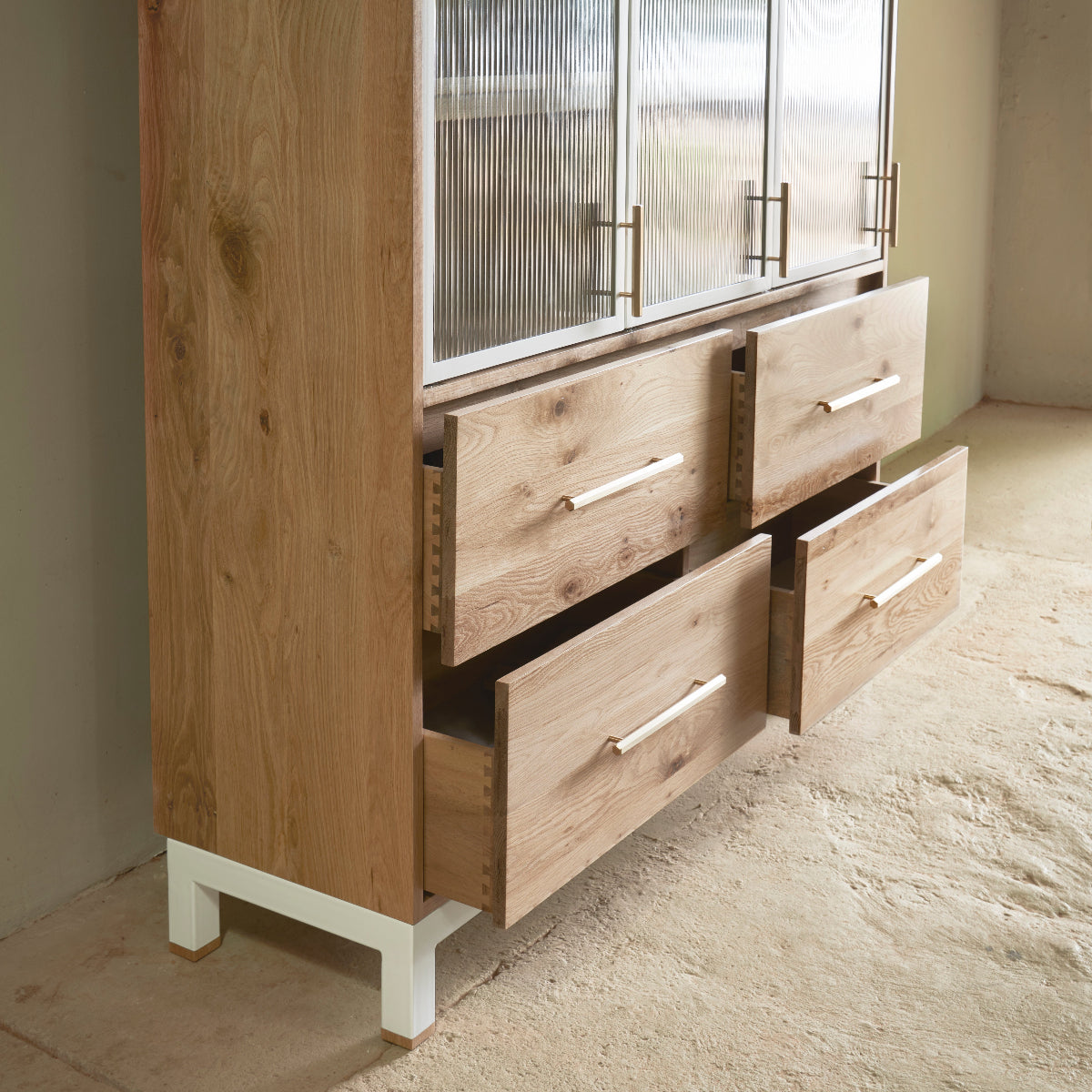 Solid Oak display cabinet with fluted glass doors and soft close drawers